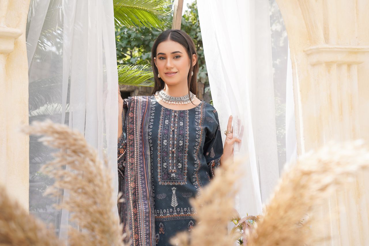 A model showcases elegant Pakistani fashion with a traditional look in Lahore.